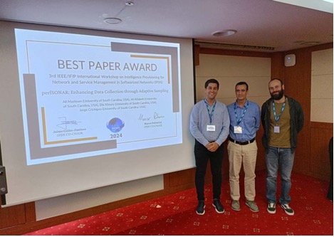 Best Paper Award, IEEE/IFIP NOMS – IPSN Workshop, Seoul, Korea, May 2024. Award received by Dr. Crichigno (center).
